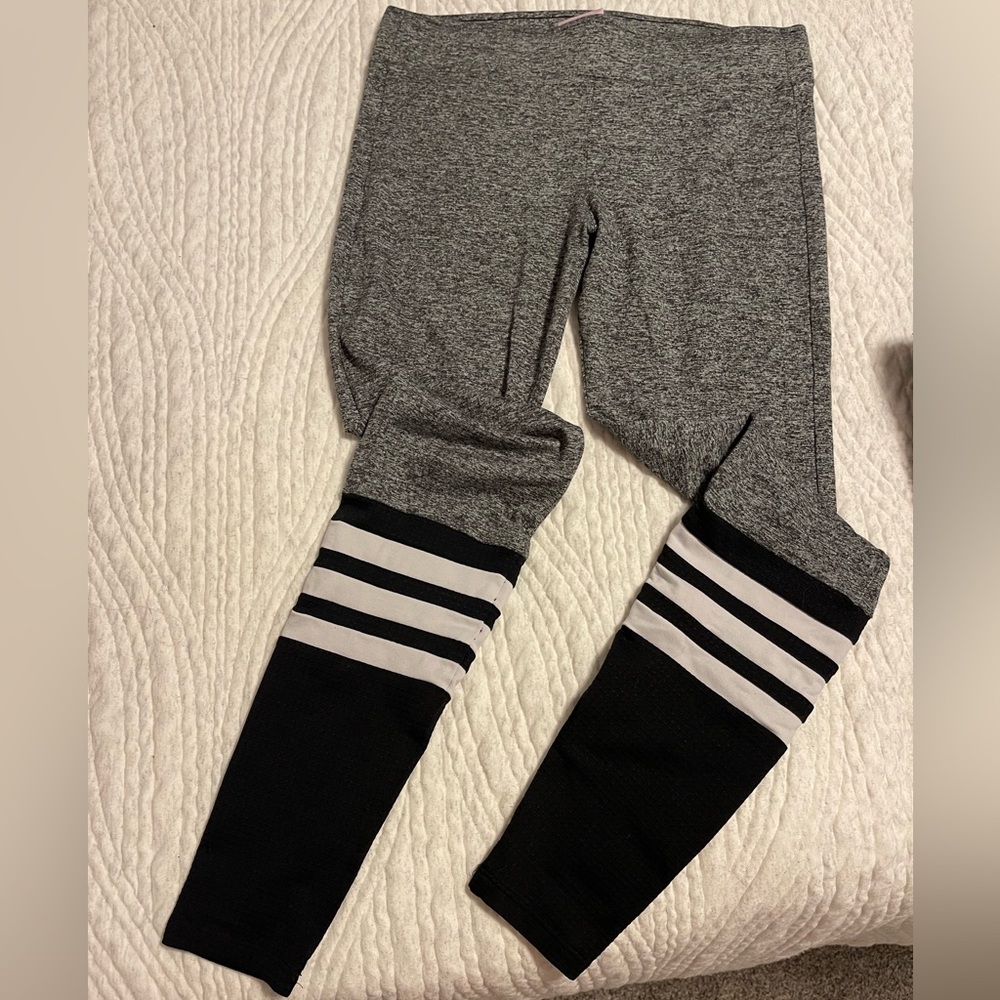 Size small awesome Bombshell leggings with high sock lower design